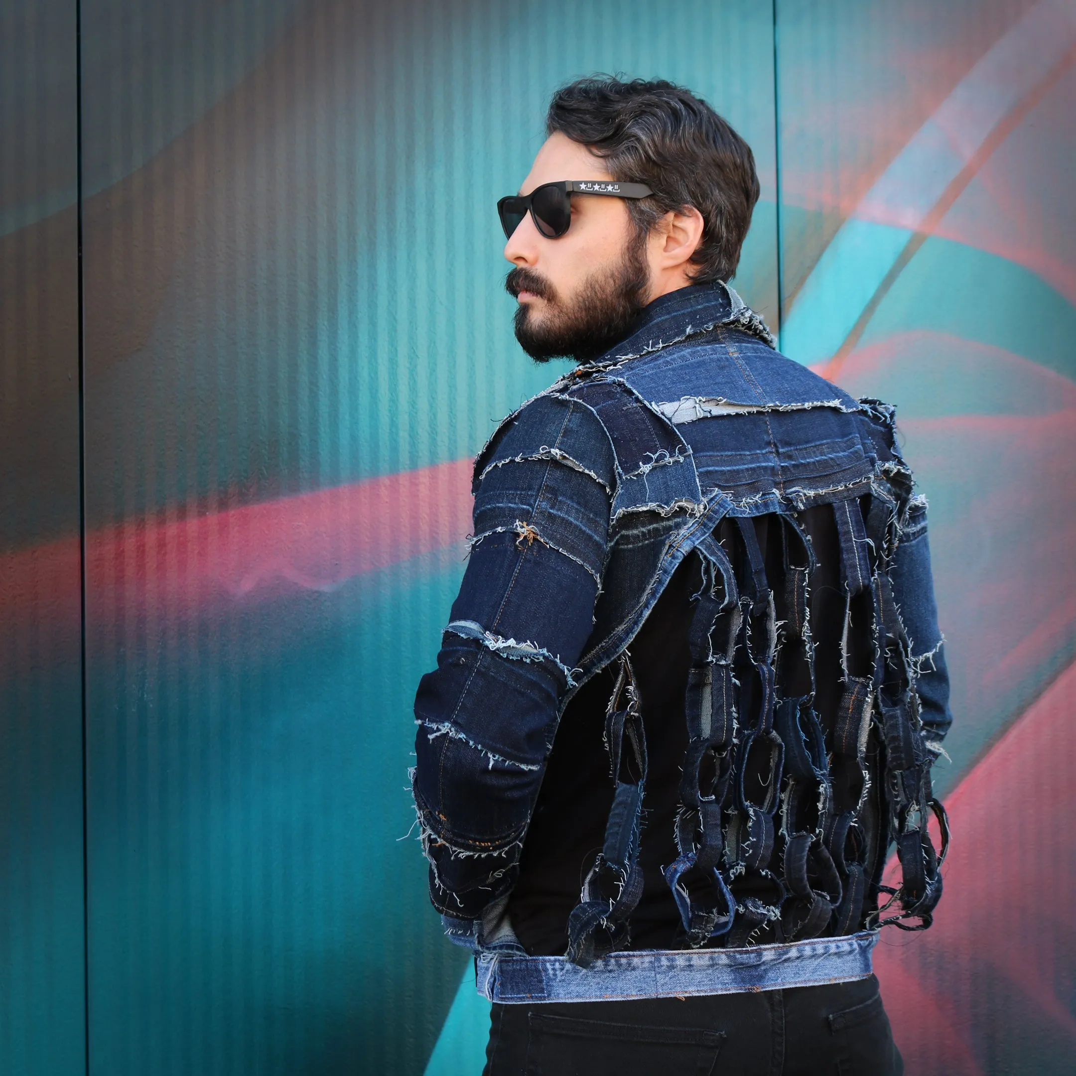 Chain Me Free - Genderless, upcycled denim jacket with chainlink back