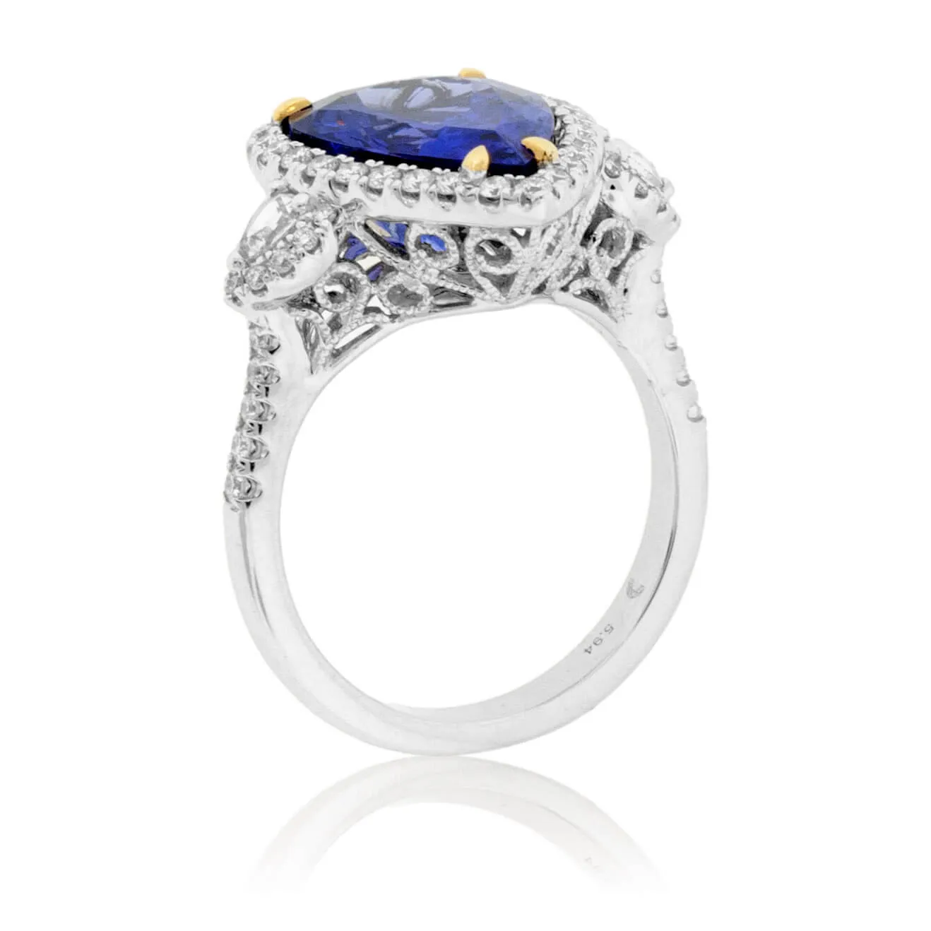 Pear-Shaped Tanzanite and Diamond Halo Ring