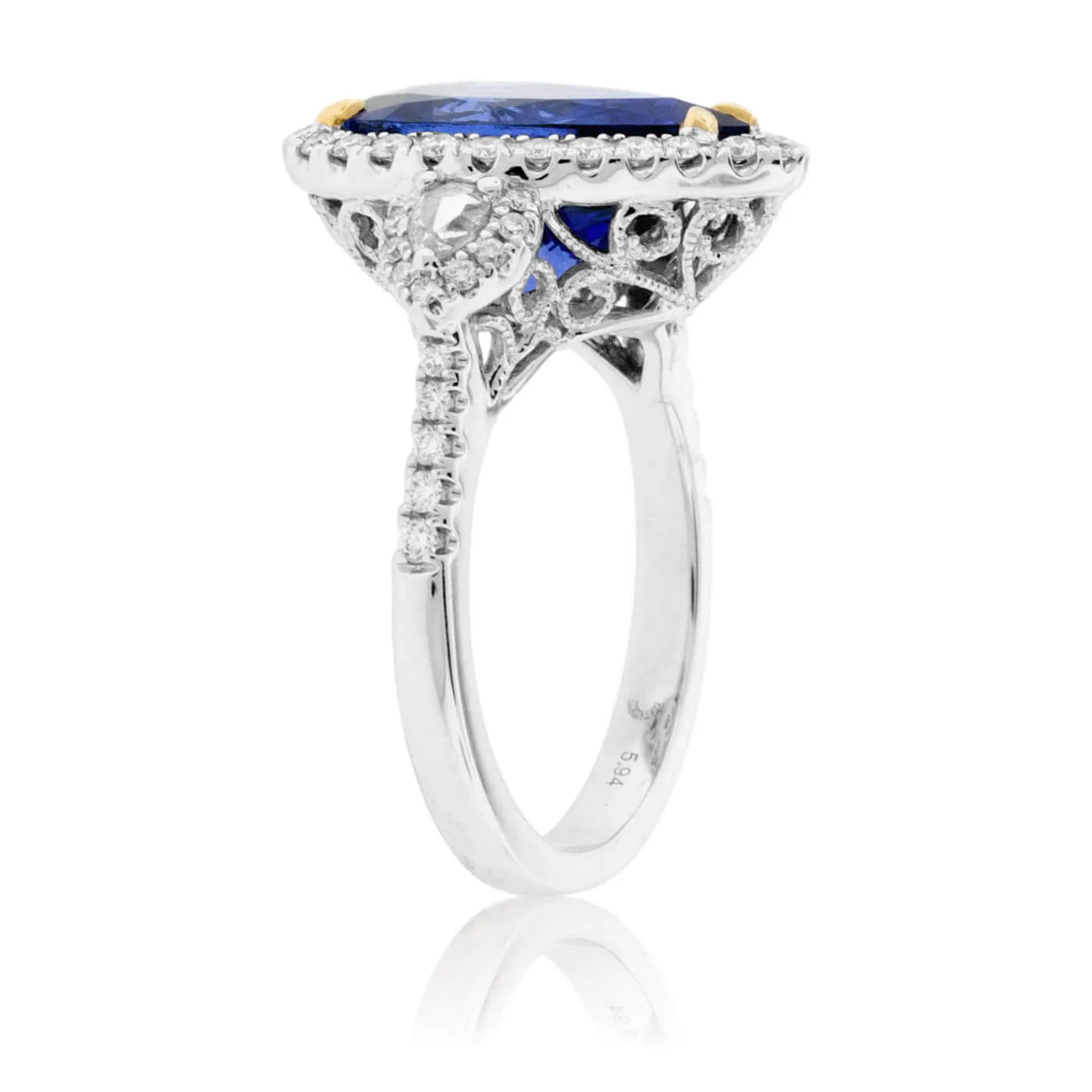 Pear-Shaped Tanzanite and Diamond Halo Ring